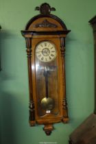 A Vienna style Walnut and other woods wall Clock with Roman numerals, fluted columns,