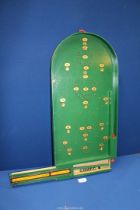 A mid 19th century Chad Valley 'Bagatelle' board game, 26'' long.