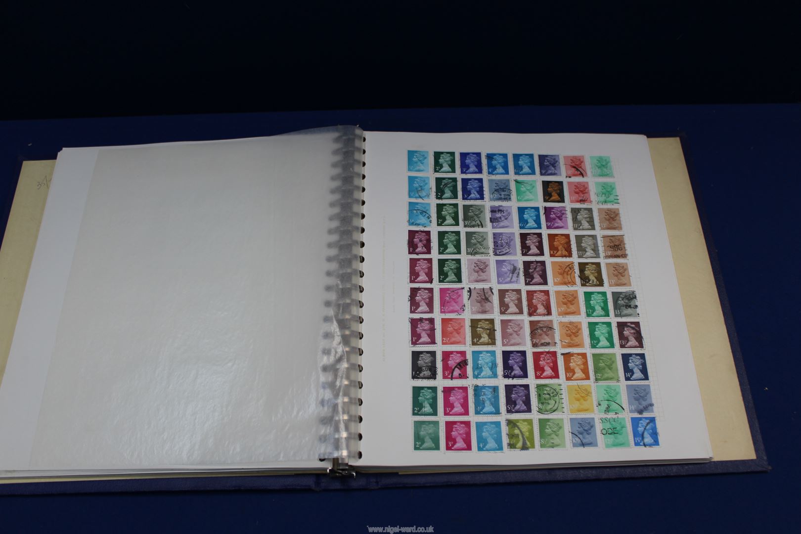 A blue lever Album with interleaves containing approximately 900 different British and World stamps. - Image 3 of 4