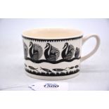 A vintage Scottie Wilson for Royal Worcester mug in swan design.