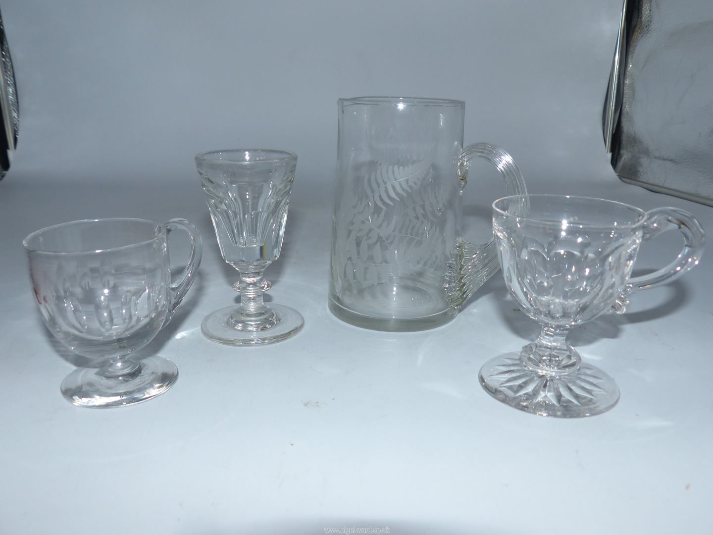 A small quantity of antique glass including; 19th Century custard cups,