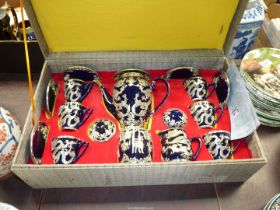 A cased Jiwenzhai *** tin inlaid Chinese Teaset comprising of six cups & saucers, milk jug,