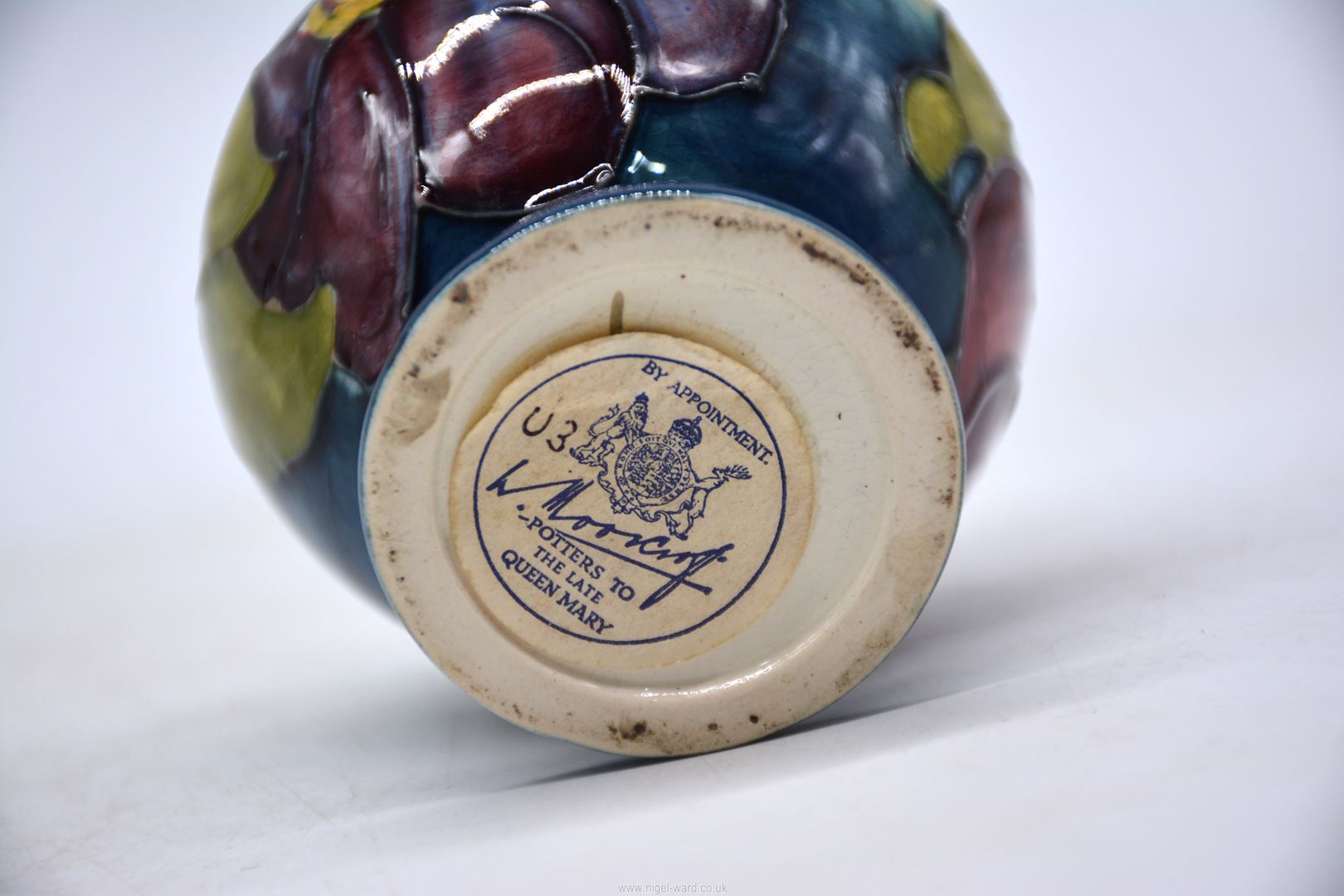 A small Moorcroft vase in Hibiscus pattern, 3 1/2" tall. - Image 2 of 2