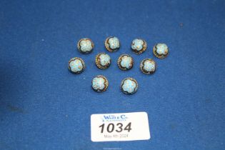 Ten antique domed Champleve buttons, possibly French.