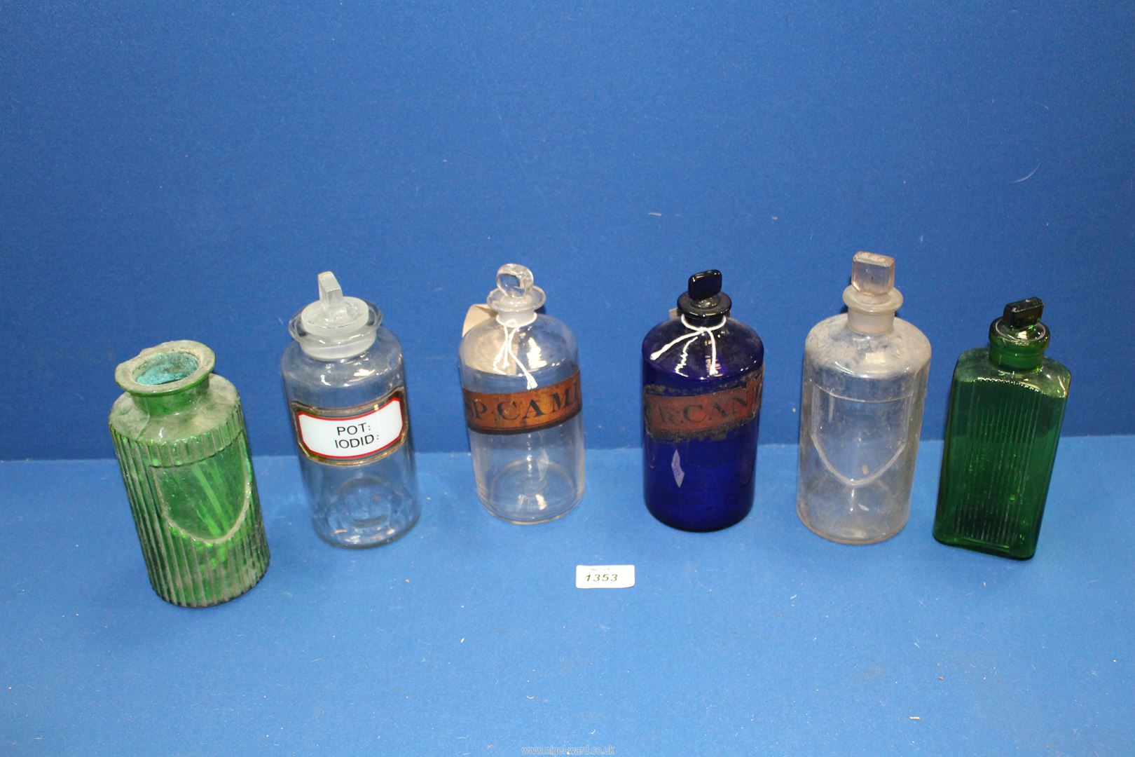 A quantity of chemist's bottles including "Pot.Iodid", "SP.Camph", "Tr.