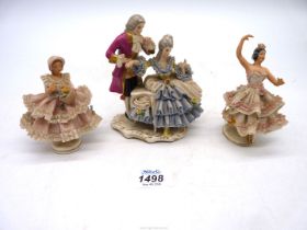 Three Dresden porcelain lace figures including; a dancer,