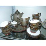 A Denby 'Marrakesh' Teaset for six including teapot and cake stand, (lid missing from sugar bowl).