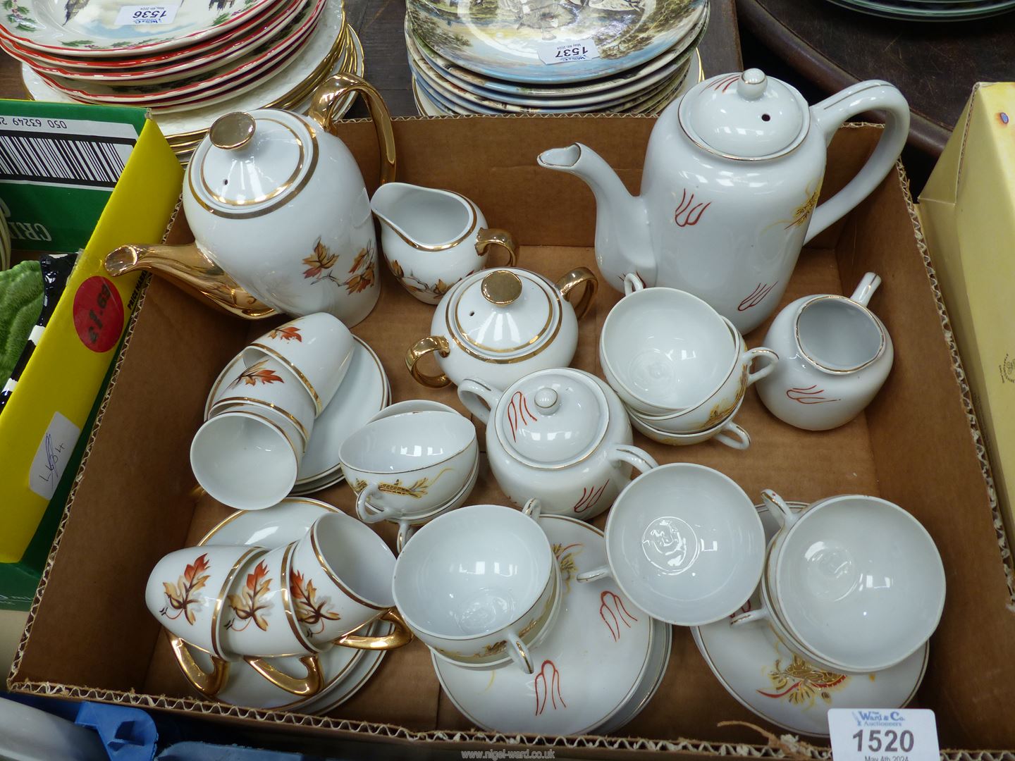 A Japanese bone china coffee set to include; coffee pot, ten cups & saucers,
