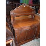 A compact Mahogany Sideboard having a frieze drawer and a pair of opposing drawers below,