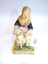 A Staffordshire figure of Dolly Pentreath - the last Cornish woman to speak the language, 7" tall.