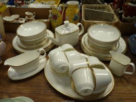 A Royal Doulton 'Gold Concord' part Dinner and tea service to include eight dinner plates,
