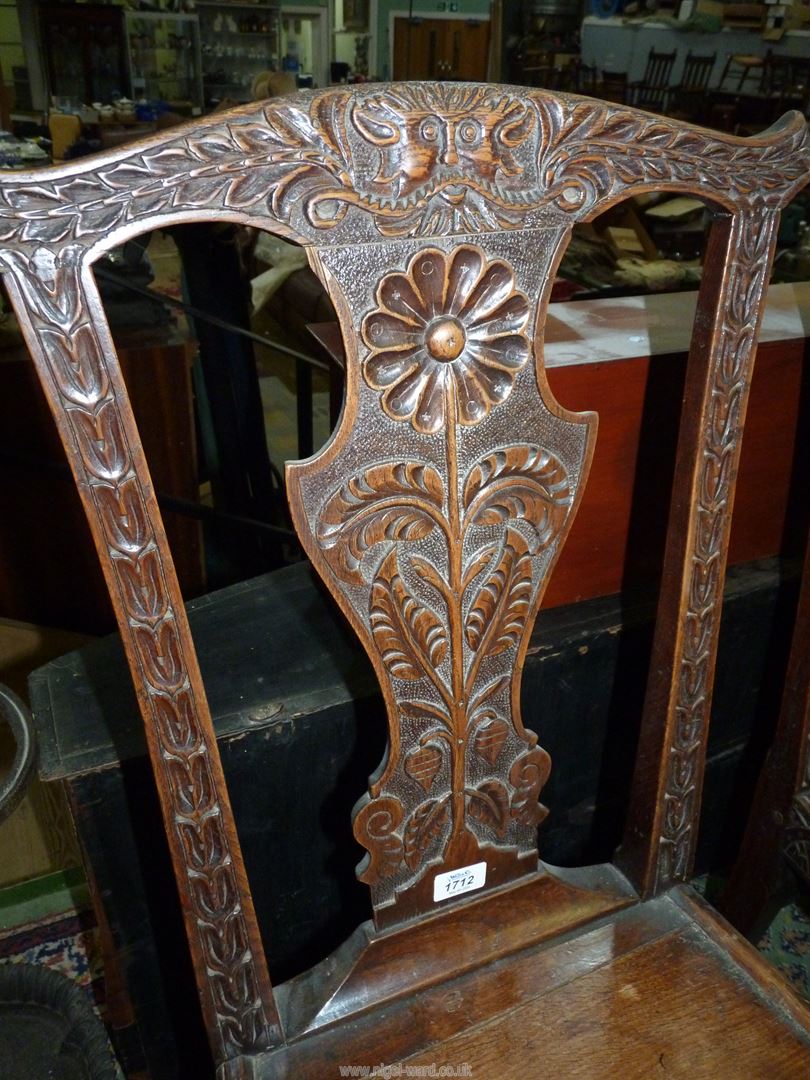 A set of four carved early Oak Dining Chairs having solid seats, - Image 2 of 5