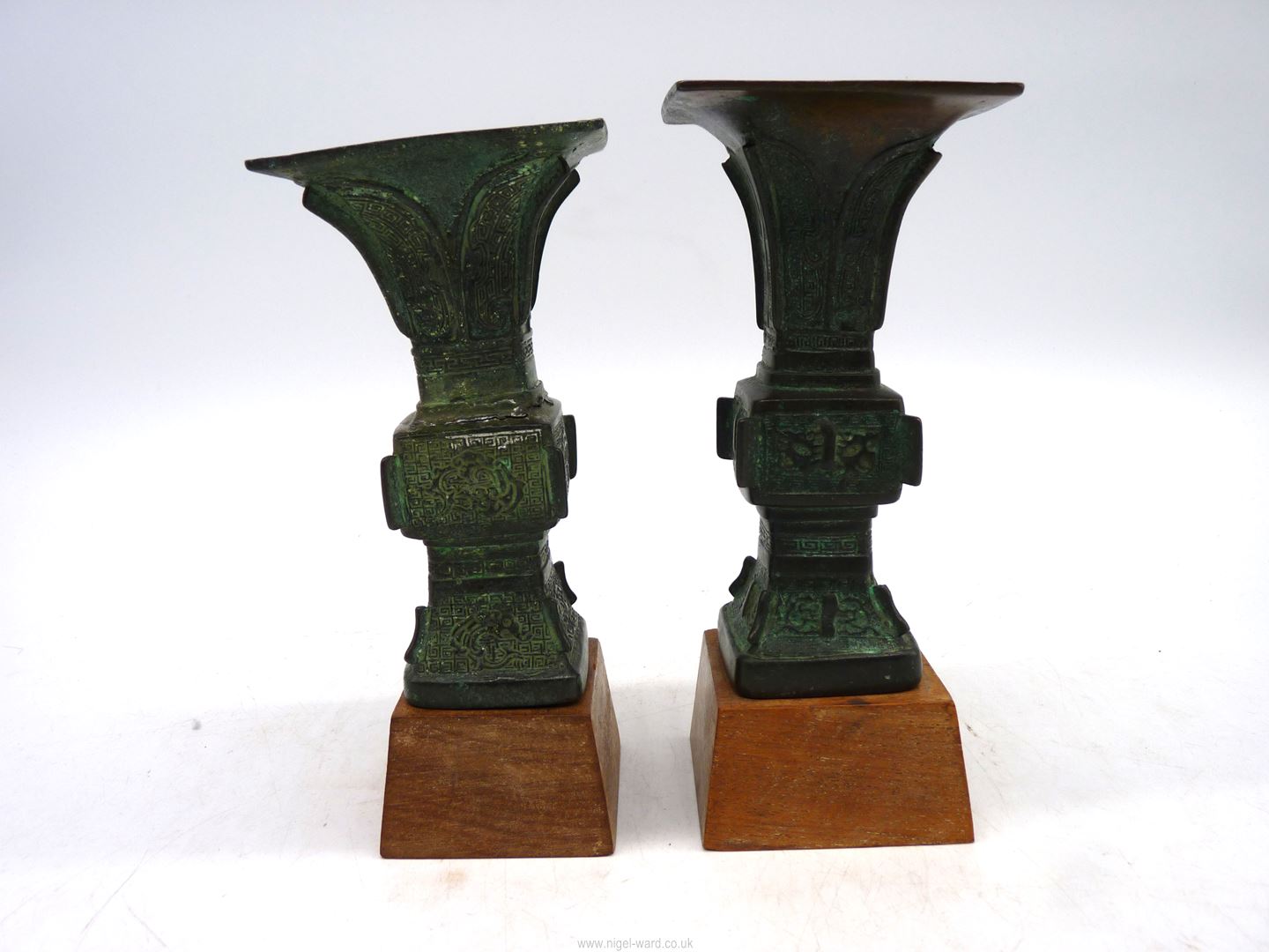 A pair of small Chinese bronze 'Gu' vases, probably Ming dynasty, on custom made wooden stands, - Image 8 of 18