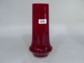 A " Riihimaki" red glass vase designed in 1963 by Tamara Aladin and having a thick curved base,