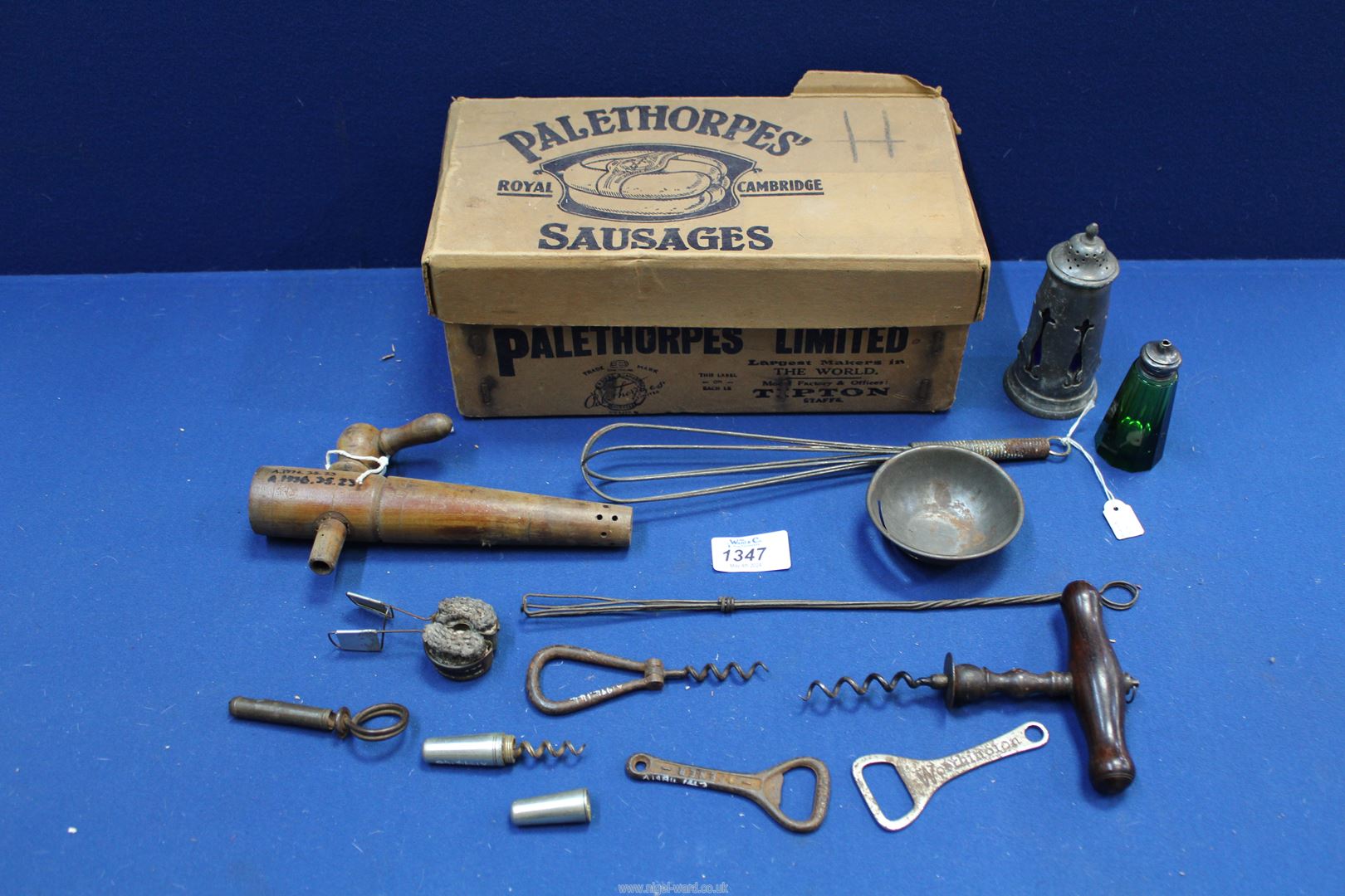 An old Palethorpe Royal Cambridge Sausages cardboard Box containing a blue glass lined pewter