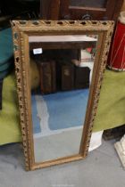A large gilt framed mirror, 41" x 19 1/4".