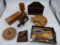 A quantity of treen including; pipe rack, candle sconce, small tray, etc.