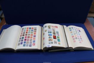 Three Eminmar Chelsea spring back Stamp Albums with extensive collections of World stamps,