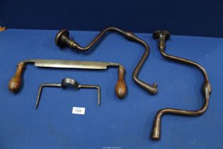 A quantity of carpenter's tools including two wrought iron braces and two draw-knives,