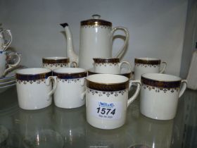 An Alfred Meakin 'Bleu De Roi' coffee pot, six Expresso cups & saucers, milk jug and sugar bowl.