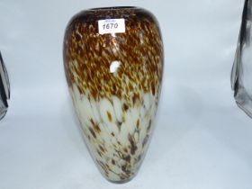 A thick heavy mottled glass vase in brown,