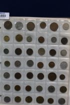 A quantity of British and Foreign coins and banknotes in a presentation album.