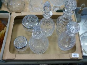 Four cut glass decanters and two rose bowls.
