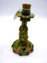 A Minton Majolica candlestick of three monkeys forming a tree, date stamp for 1861, Reg No: 128616,