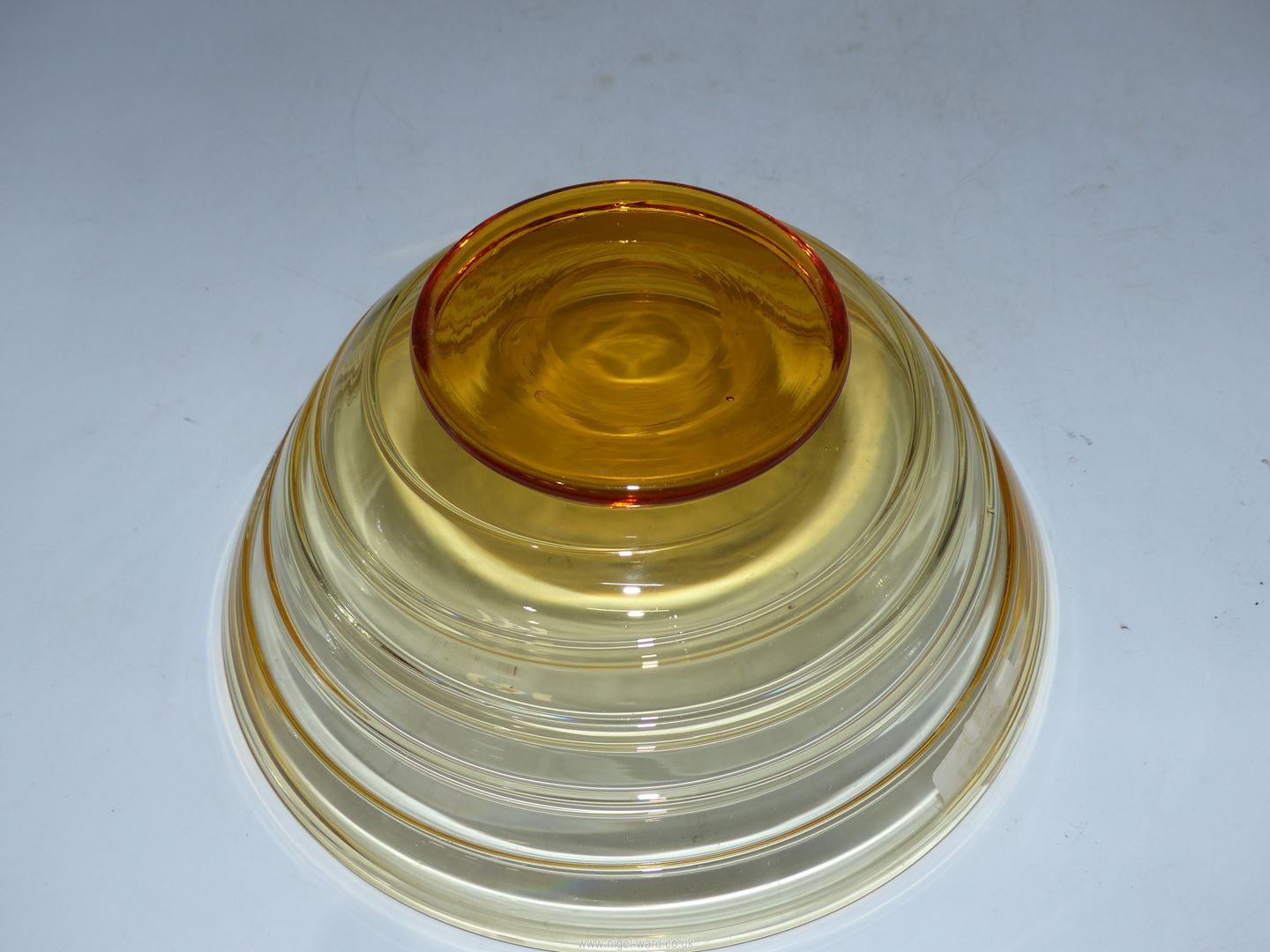 A 1930's Whitefriars conical shaped amber glass bowl by Barnaby Powell having spiralled trails and - Image 2 of 2