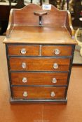 An apprentice piece Chest of Drawers with back stand, 11'' wide x 8'' deep x 7 1/4'' high.