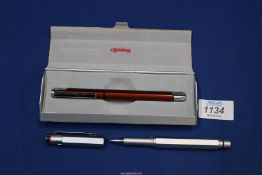 A Rotring fountain pen (cased) and Rotring metal ballpoint pen.