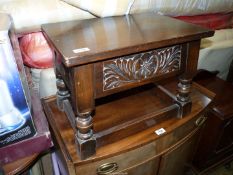 An Oak locker top Stool/occasional Table standing on turned legs united by perimeter stretchers and