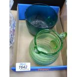 A 19th century green glass wine cooler and a small green glass jug.