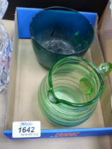 A 19th century green glass wine cooler and a small green glass jug.