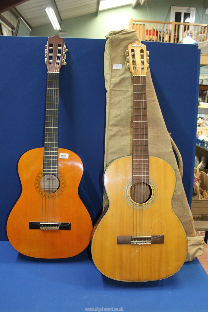 A Lorenzo Guitar in a canvas case and a Hohner "Concerta" guitar, a/f.