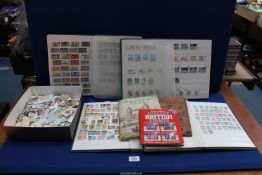 A Quantity of loose stamps, four Stamp stock books with many mixed stamps,