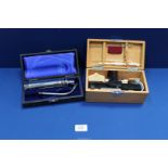 Two medical kits; Kolormeter in wooden box and ENT Probe Light.