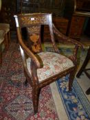 A most attractive Walnut and other woods Marquetry decorated open armed Elbow Chair,