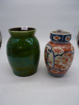 A blue/red Japanese Imari vase, (base cracked) and a large green glaze Pottery Vase, C.H.