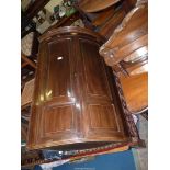 A good quality Cabinet maker made Mahogany bow fronted Corner Cupboard having inlaid shell detail,