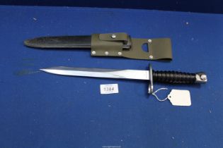 A Swiss SIG Bayonet and scabbard. ****ALL WEAPONS MUST BE COLLECTED IN PERSON - NO POSTAGE.