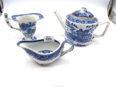 Three items of blue and white china including a helmet creamer (5 1/2'' tall),