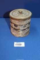 A pretty brass over leather String Box having decoration of swags and bows, 4" tall.