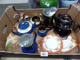 A quantity of china to include; blue teapot with stand, water jug, milk and sugar,