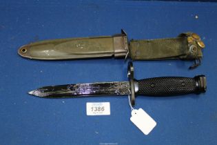 An Armalite M16 Bayonet and scabbard. ****ALL WEAPONS MUST BE COLLECTED IN PERSON - NO POSTAGE.