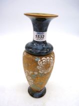 A Doulton Lambeth Vase, with blue base and neck, the body decorated in gold, turquoise and white,