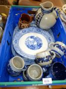 A quantity of china including blue and white willow pattern meat plate, cake stand,