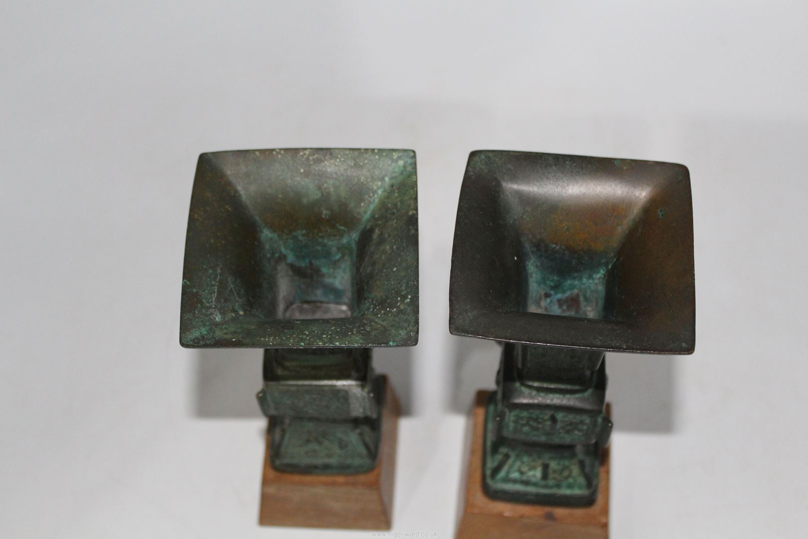 A pair of small Chinese bronze 'Gu' vases, probably Ming dynasty, on custom made wooden stands, - Image 4 of 18