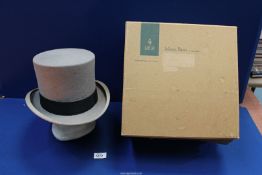 A silver/grey Top hat by Moss Bros, size 7, with accompanying hat box.