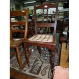 A possibly Edwardian Mahogany framed Bedroom Chair having turned front legs and details to the back,